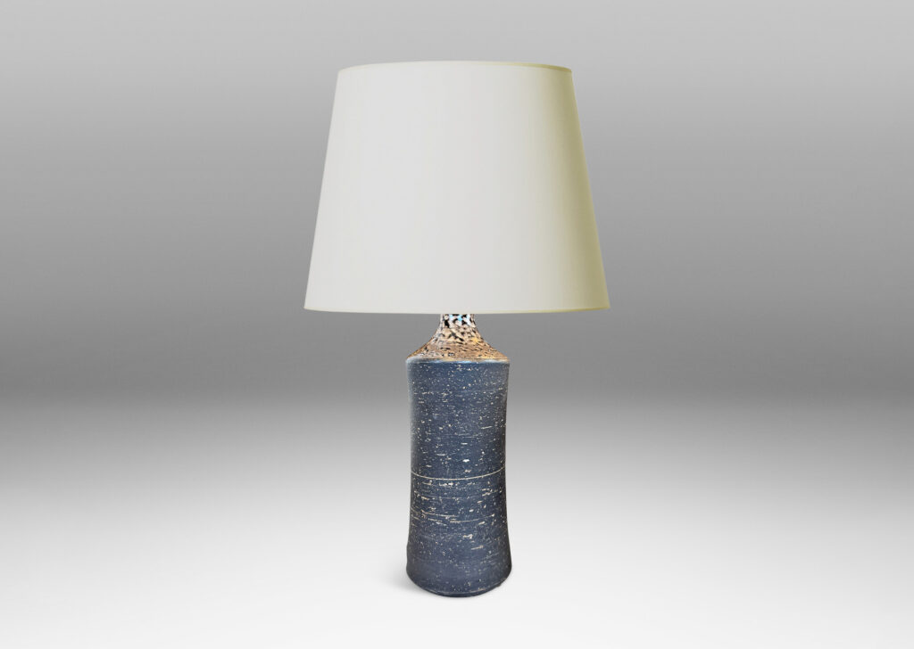 Gallery BAC concave sided cylindrical forms with grog texture and matte brown glaze, with shiny brown caps