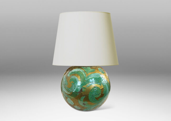 Gallery BAC globe form in craquel verre églomisé, back-painted in a scrolling pattern in gold and pale green tones