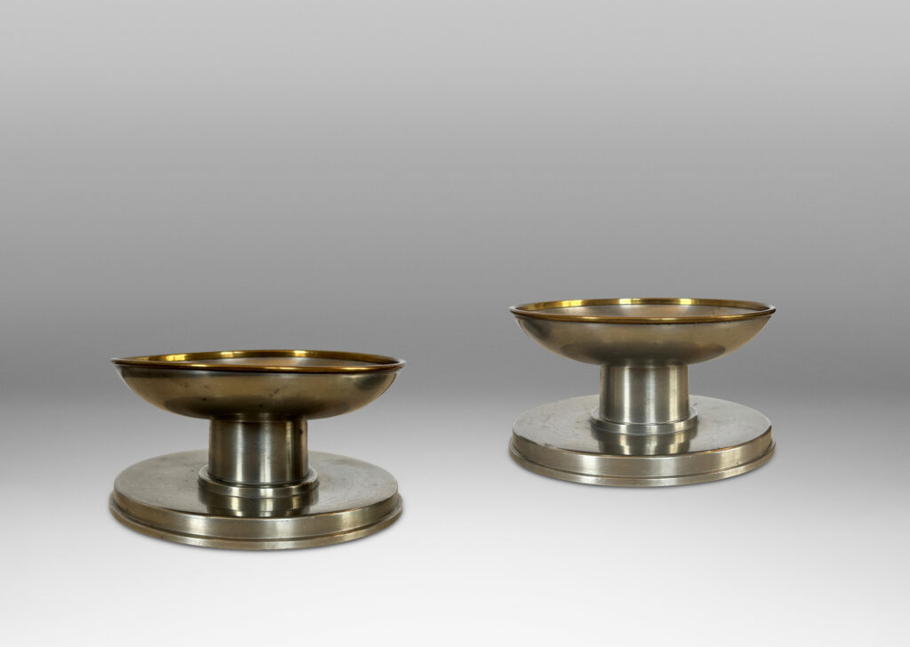 Gallery BAC muscular plinth bases, short stout stands and wide cup bobèches with contrasting edge detail