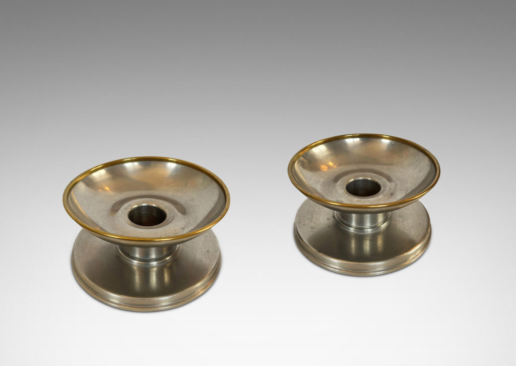Gallery BAC muscular plinth bases, short stout stands and wide cup bobèches with contrasting edge detail