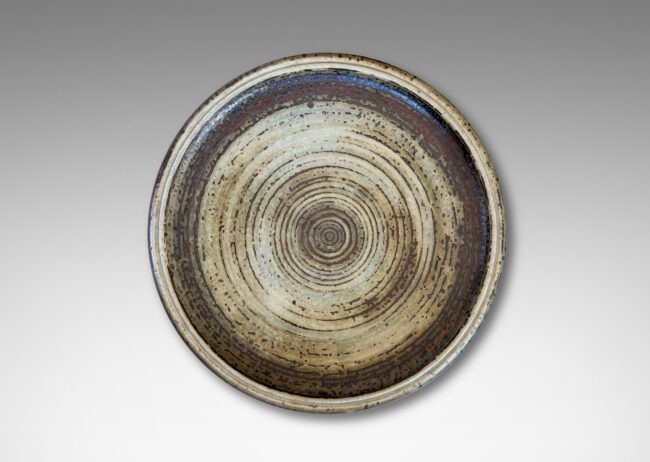 Gallery BAC shallow organically modeled curving sides, concentric ridging, and a handsome brown and pale gray
