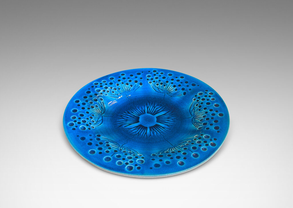 Gallery BAC wide curving lip and carved design of dill or yarrow flower umbels, glazed in a saturated shiny azure, with matte pale gray reverse