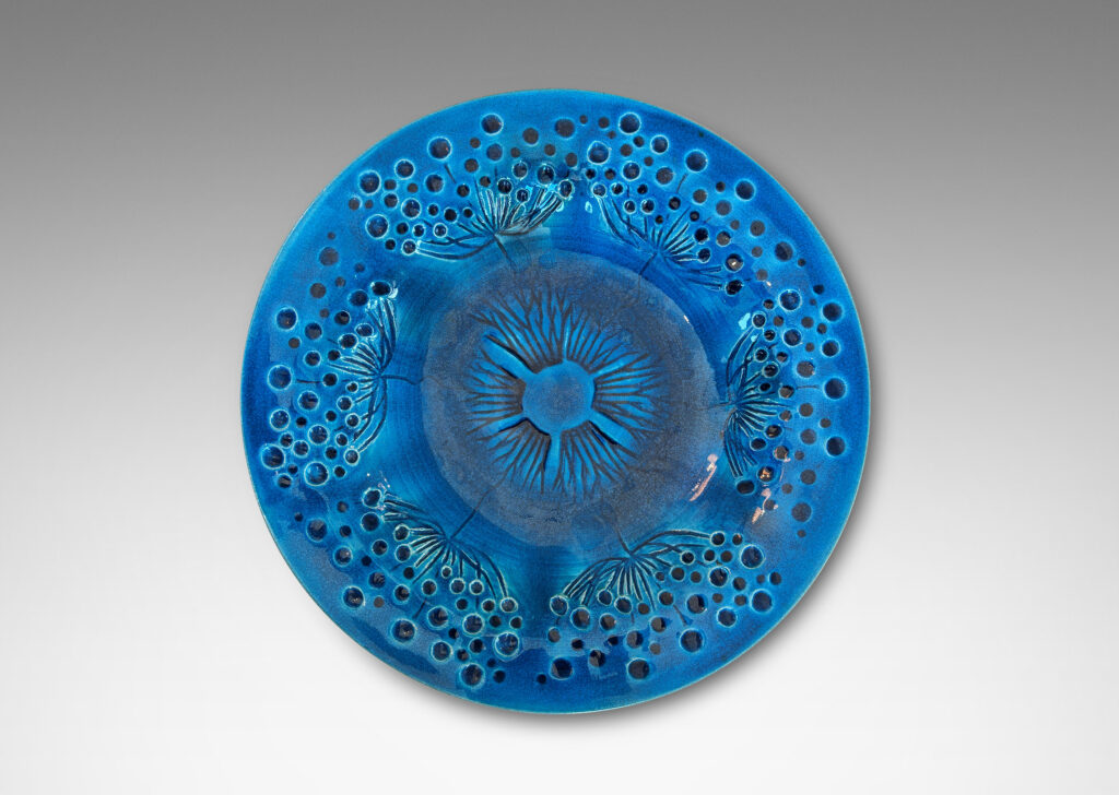 Gallery BAC wide curving lip and carved design of dill or yarrow flower umbels, glazed in a saturated shiny azure, with matte pale gray reverse