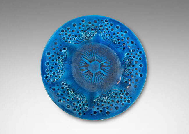 Gallery BAC wide curving lip and carved design of dill or yarrow flower umbels, glazed in a saturated shiny azure, with matte pale gray reverse