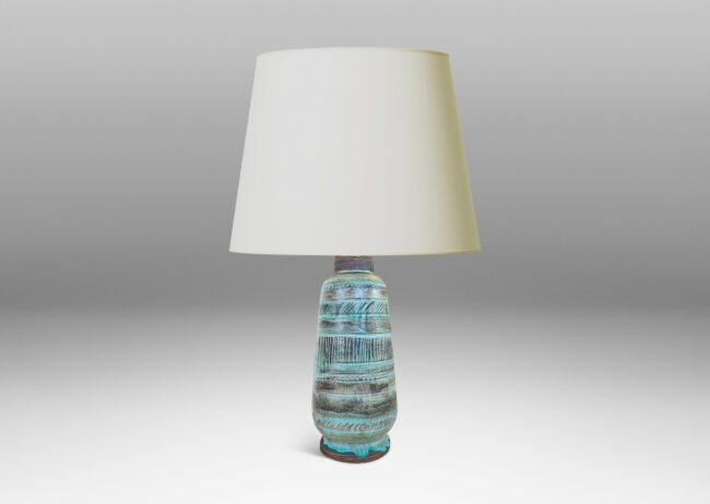 Gallery BAC tapered cylindrical form with rounded edged and carved pinstripes and hatches, glazed in a light turquoise over matte brown