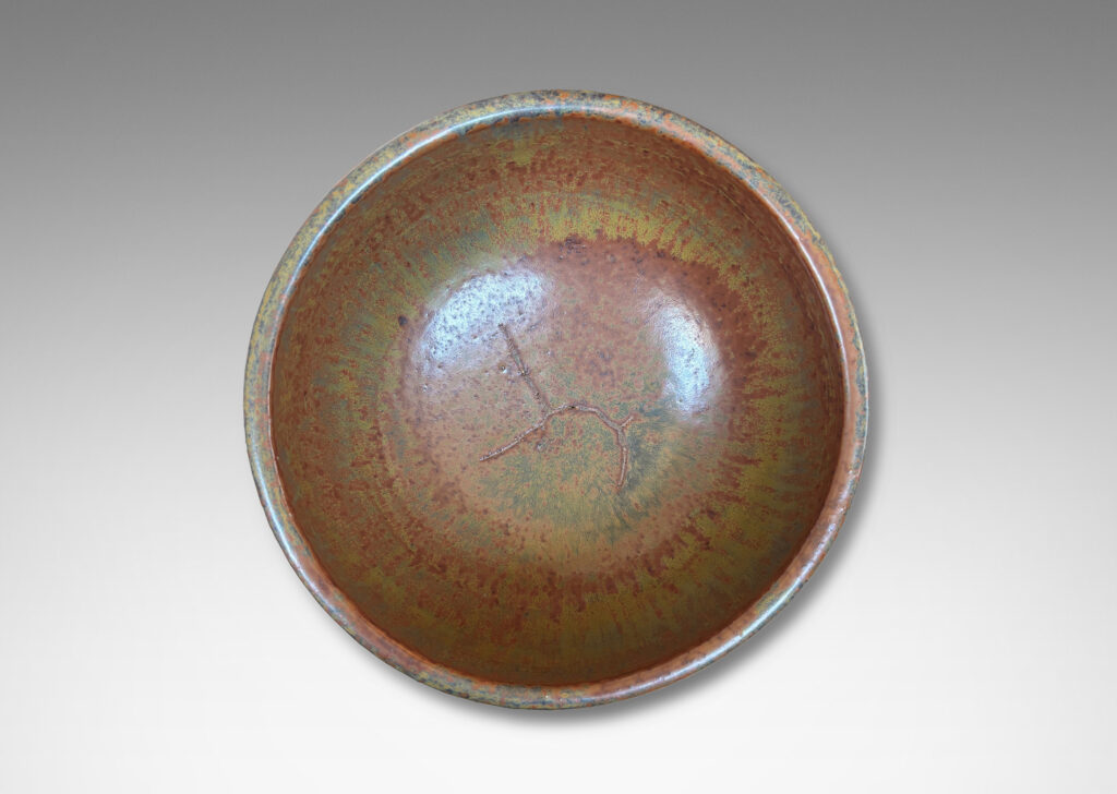 Gallery BAC sculptural muscular form with quadruped base, glazed in flowing drab green, with hints of warm brown and black