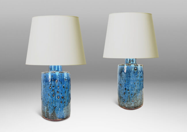 Gallery BAC arge cylindrical forms with coved necks, glazed in a very handsome deep cornflower blue with metal dappling