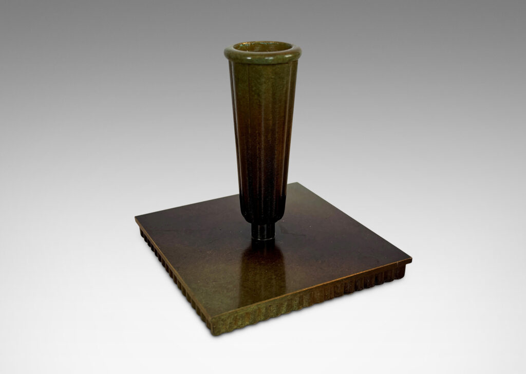Gallery BAC fluted trumpet sockets and square base over a scalloped reveals, finished with a handsome enameled verdigris-antique patination