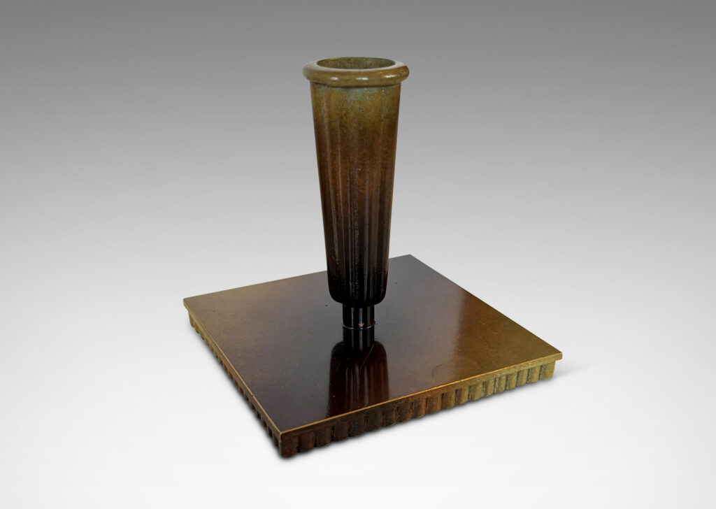 Gallery BAC fluted trumpet sockets and square base over a scalloped reveals, finished with a handsome enameled verdigris-antique patination