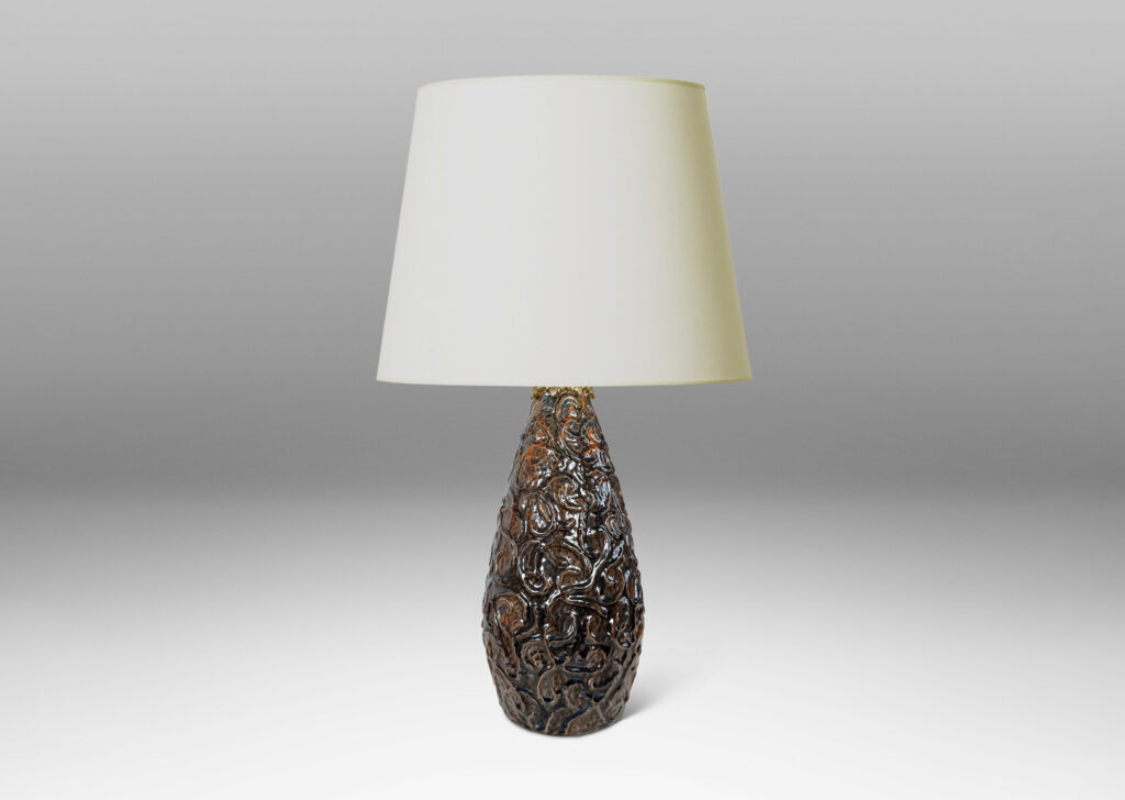 Gallery BAC large drop form with scrolling reliefs and carved gouged texture, glazed in a shiny dark brown