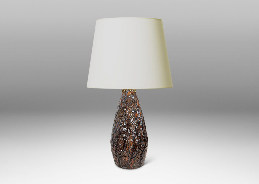 Gallery BAC large drop form with scrolling reliefs and carved gouged texture, glazed in a shiny dark brown