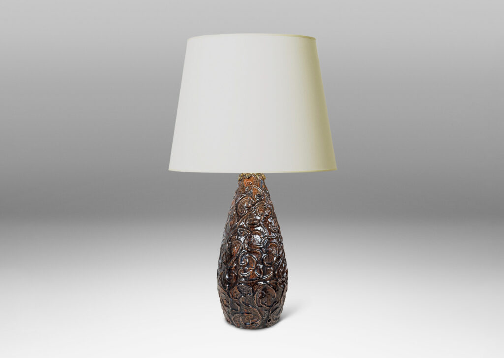 Gallery BAC large drop form with scrolling reliefs and carved gouged texture, glazed in a shiny dark brown