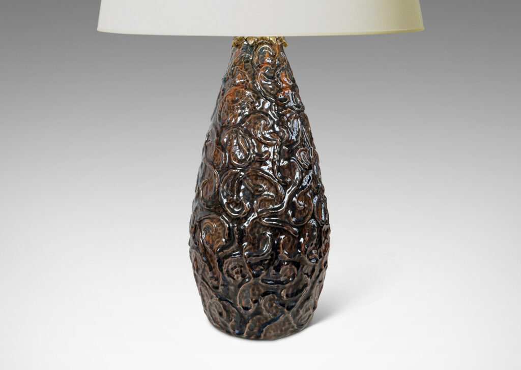 Gallery BAC large drop form with scrolling reliefs and carved gouged texture, glazed in a shiny dark brown