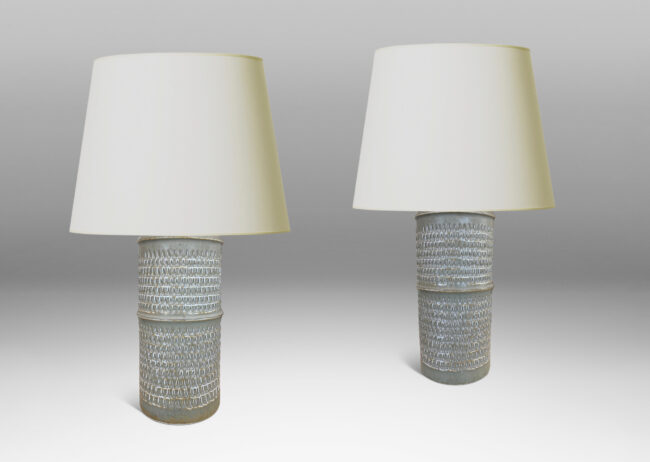 Gallery BAC large cylindrical forms with notched bands and relief rows of triangle motifs, glazed in light warm gray