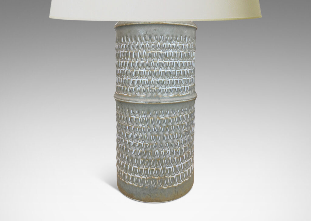 Gallery BAC large cylindrical forms with notched bands and relief rows of triangle motifs, glazed in light warm gray