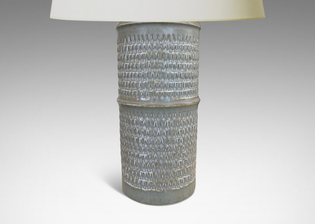Gallery BAC large cylindrical forms with notched bands and relief rows of triangle motifs, glazed in light warm gray
