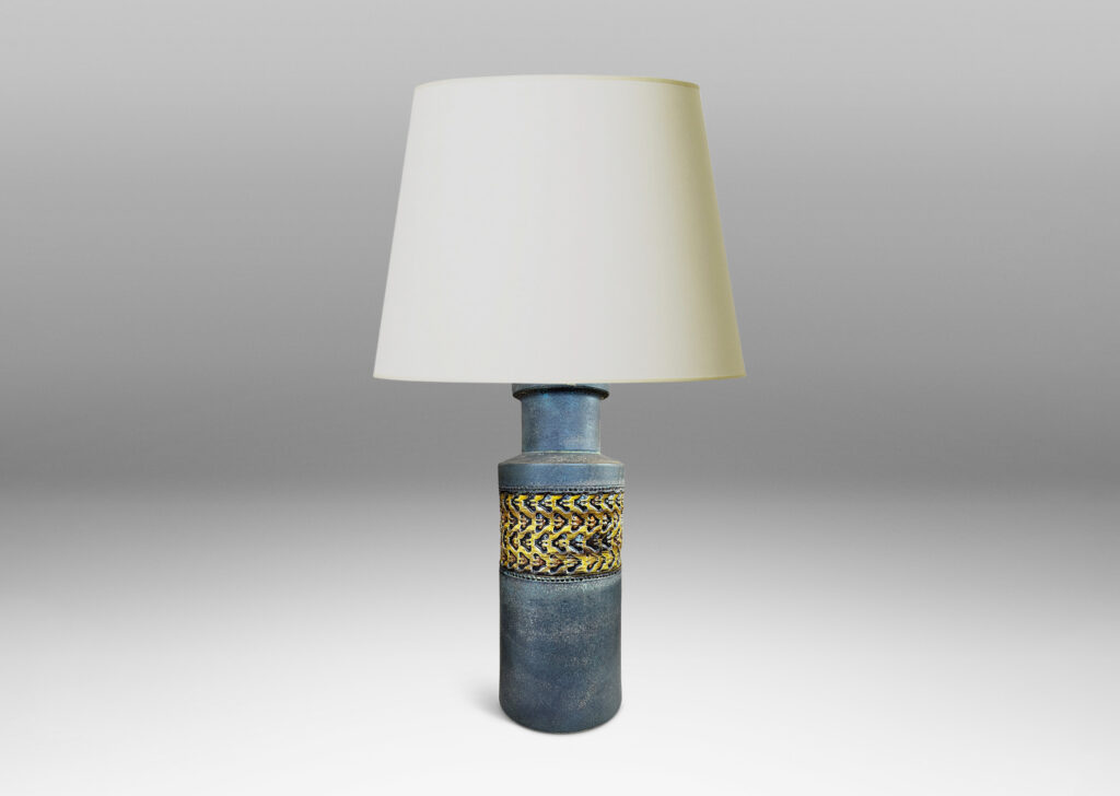 Gallery BAC rationalized canister form in matte brown, with wide bands with impressed ornaments glazed in a gloss coffee brown
