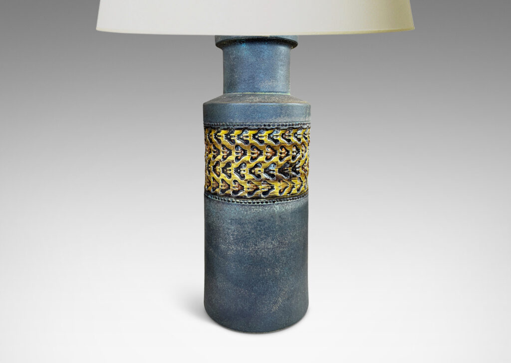 Gallery BAC rationalized canister form in matte brown, with wide bands with impressed ornaments glazed in a gloss coffee brown