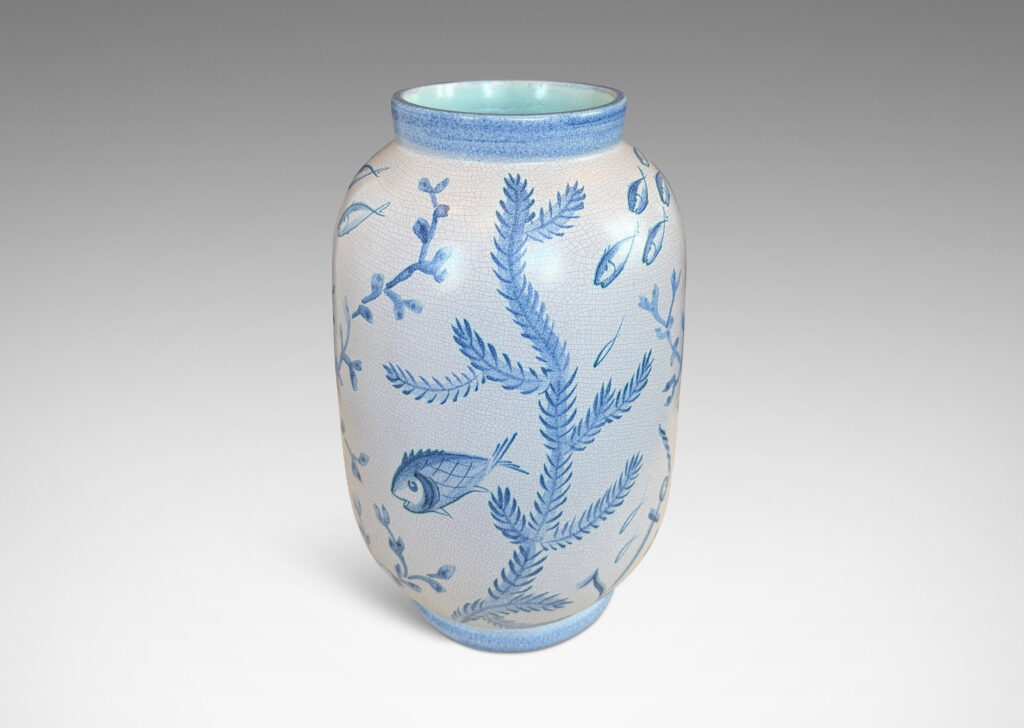 Gallery BAC tall ovoid form with fish form finial, glazed in a craquel very pale gray, surrounded with charming hand-painted pictures of marine flora and fauna in blue