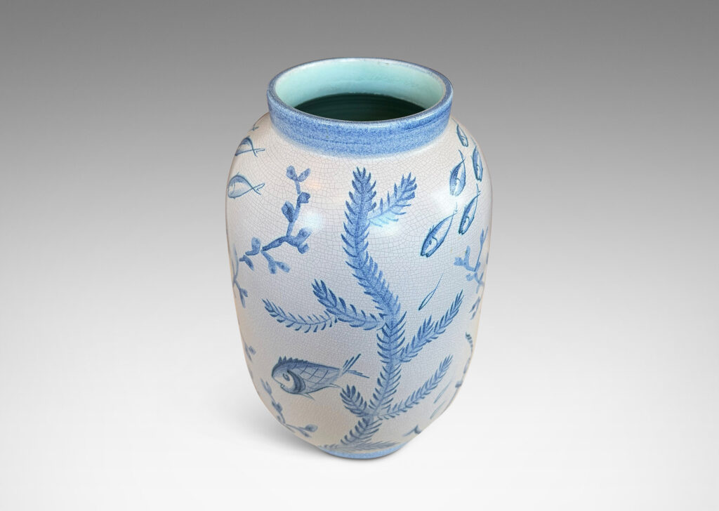 Gallery BAC tall ovoid form with fish form finial, glazed in a craquel very pale gray, surrounded with charming hand-painted pictures of marine flora and fauna in blue