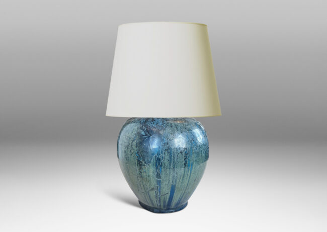 Gallery BAC tapered globe form, magnificently glazed in a flowing grayish blue with floral evoking crystalline pattern on shoulders