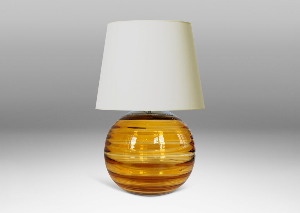 Gallery BAC globe form with internal horizontal banding, hand-blown in orange tint glass, steel mount