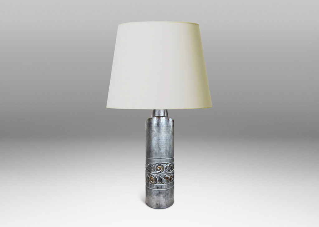Gallery BAC columnar forms with relief bands of folk foliage, glazed in luster brown