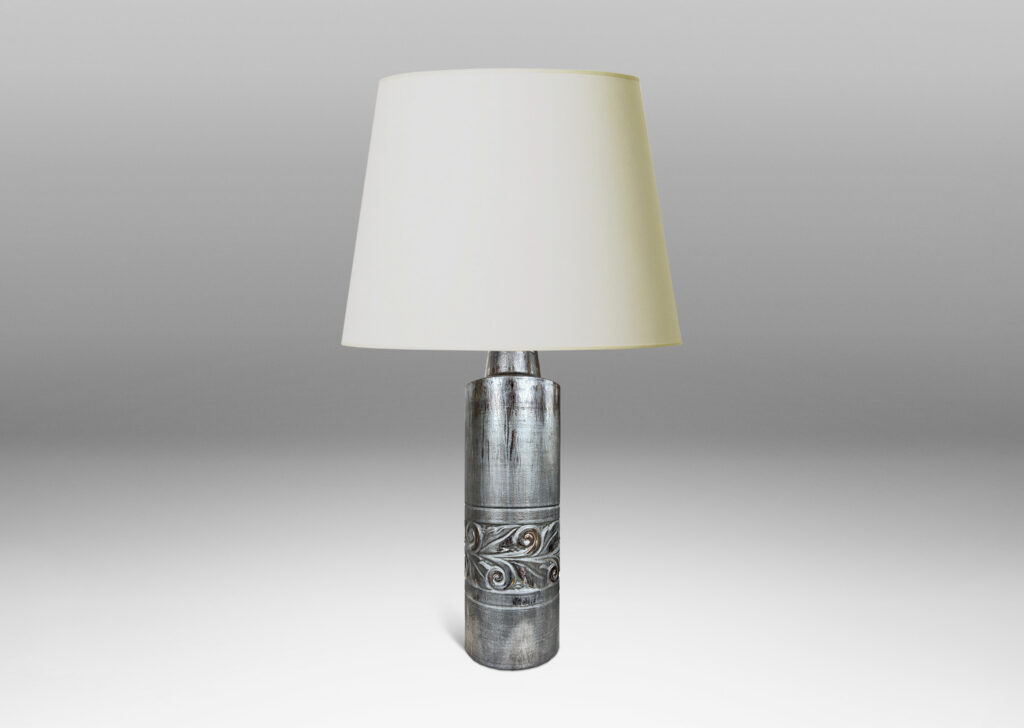 Gallery BAC columnar forms with relief bands of folk foliage, glazed in luster brown