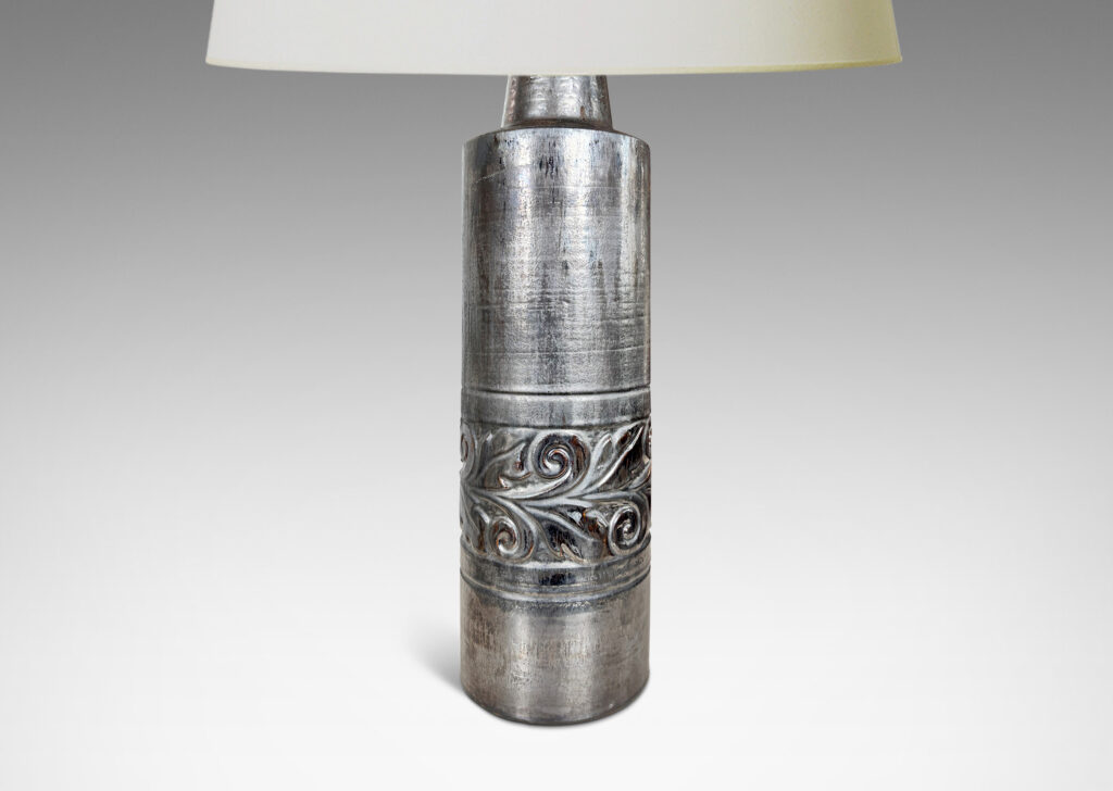 Gallery BAC columnar forms with relief bands of folk foliage, glazed in luster brown