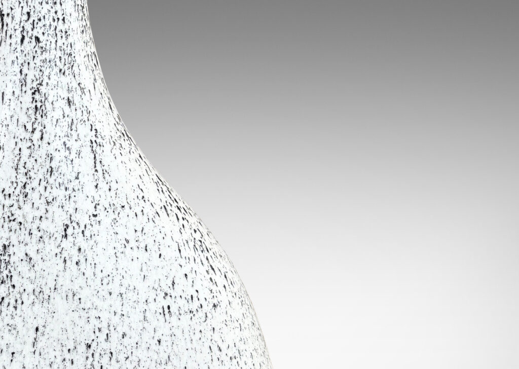 Gallery BAC compressed decanter form, with triangular body and tall neck, in white-black