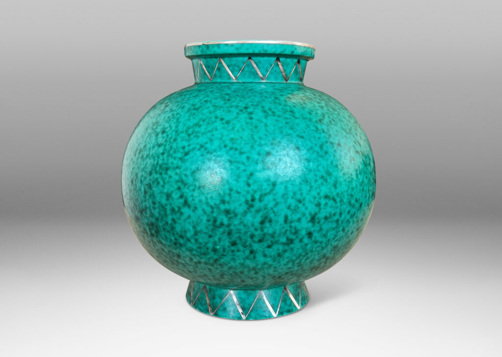 Gallery BAC plump globe form with flanged neck and base, glazed in a mottled blue-green