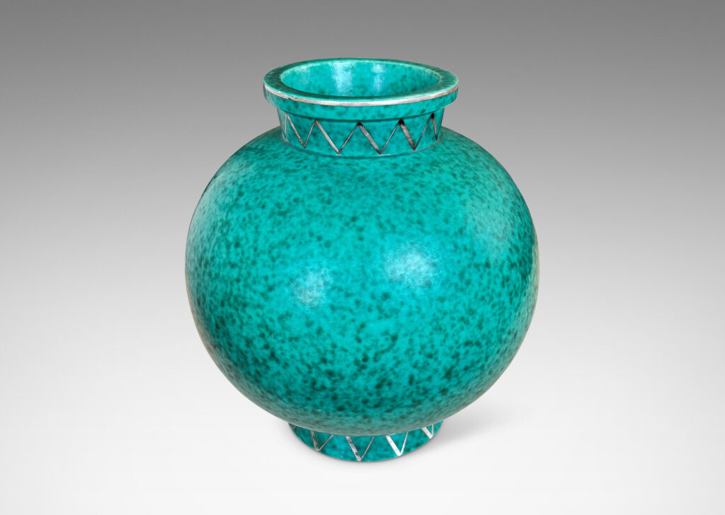 Gallery BAC plump globe form with flanged neck and base, glazed in a mottled blue-green