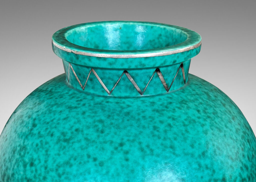 Gallery BAC plump globe form with flanged neck and base, glazed in a mottled blue-green