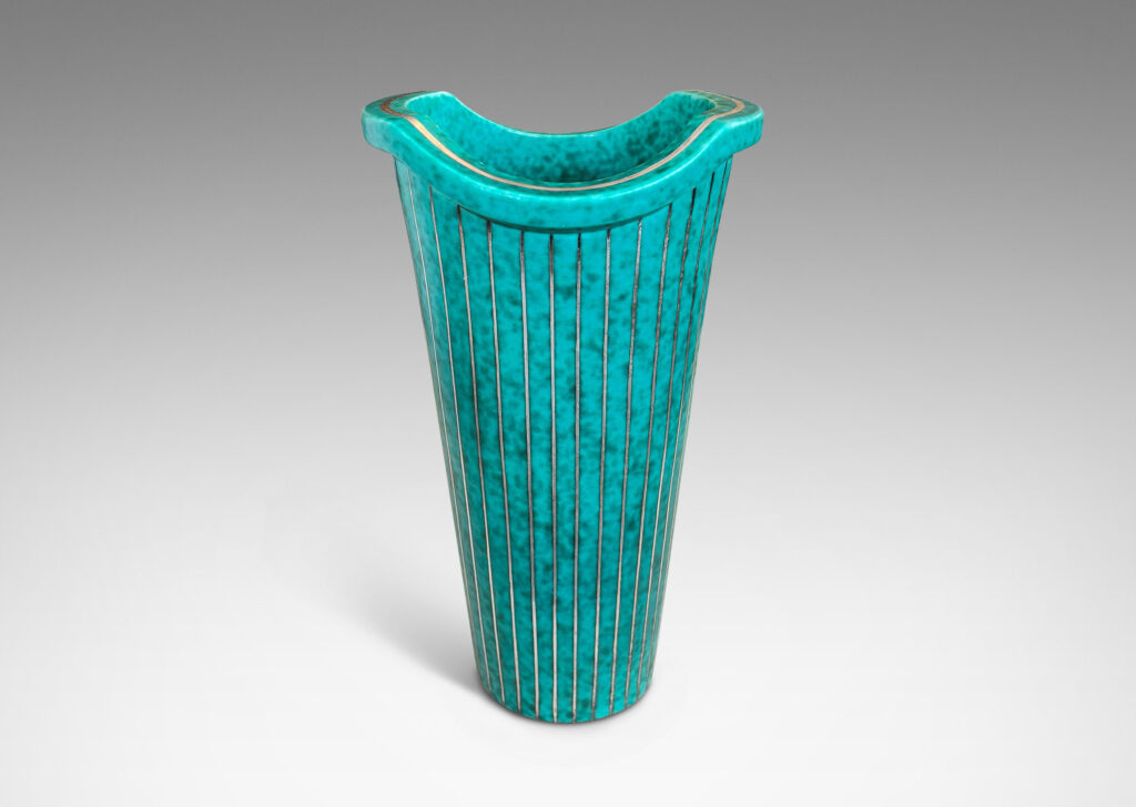 Gallery BAC tapered cylindrical form with a flanged and notched lip, glazed in a mottled blue-green