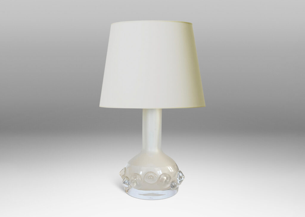 Gallery BAC decanter forms with attenuated necks and applied relief of demi-spheres in clear glass