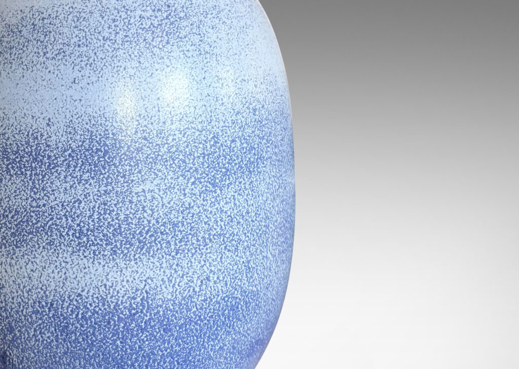 Gallery BAC ovoid form with stem-like neck and leaves in high relief, glazed in light to deep tonal French blue