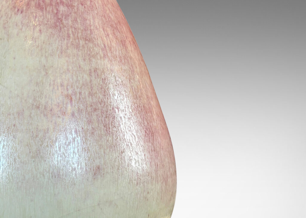 Gallery BAC bulbous form on a notched disk reveal, glazed in ochre-tan and hints of burnt sienna