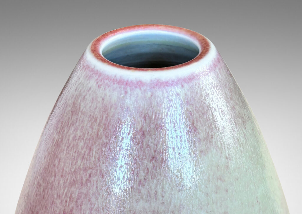 Gallery BAC bulbous form on a notched disk reveal, glazed in ochre-tan and hints of burnt sienna