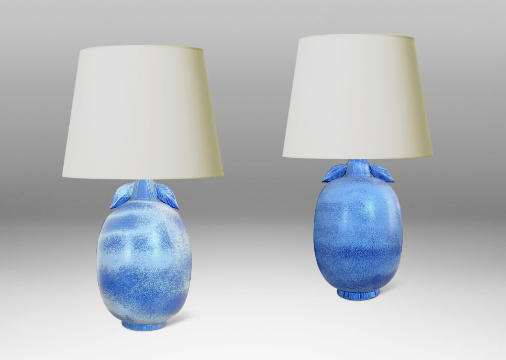 Gallery BAC ovoid forms with stem-like neck and leaves in high relief, glazed in light to deep tonal French blue