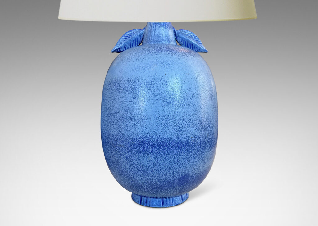 Gallery BAC ovoid forms with stem-like neck and leaves in high relief, glazed in light to deep tonal French blue