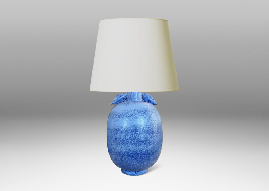 Gallery BAC ovoid forms with stem-like neck and leaves in high relief, glazed in light to deep tonal French blue