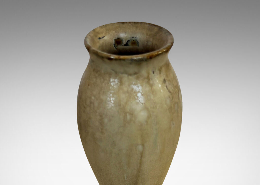 Gallery BAC sinuously modeled double gourd form, glazed in a flowing pale tan with flushes of brown