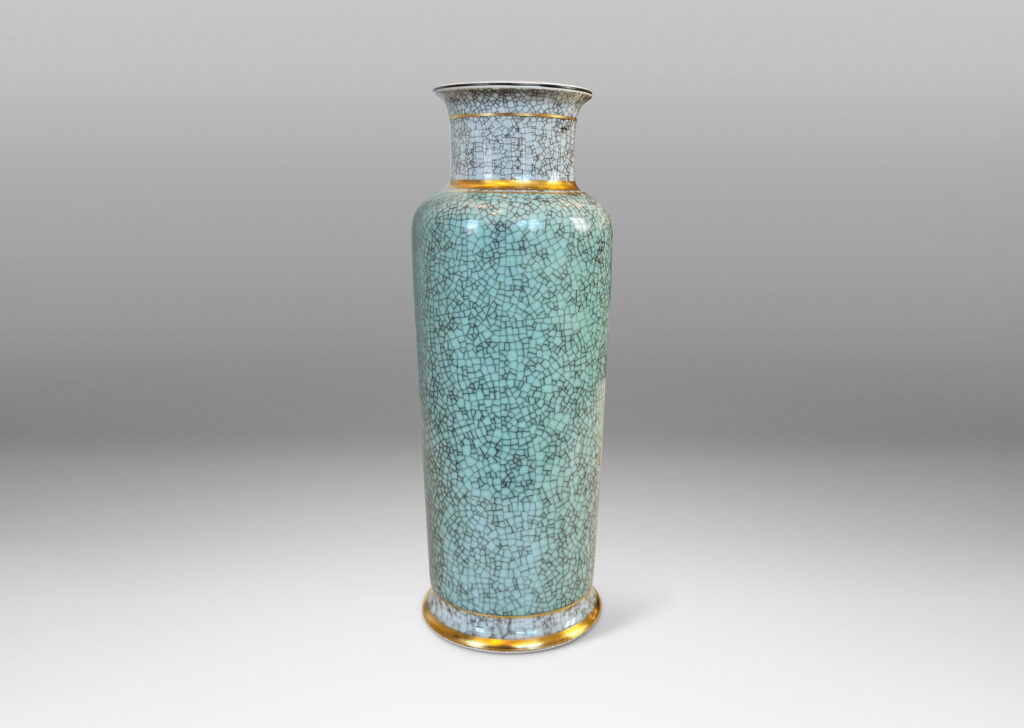 Gallery BAC tapered form with wide mouth and articulated lip, glazed in craquel celadon and pale gray, with gilded details