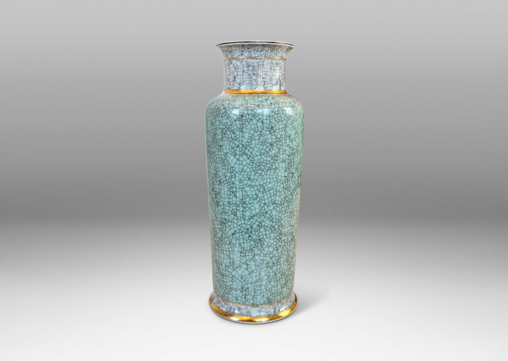 Gallery BAC tapered form with wide mouth and articulated lip, glazed in craquel celadon and pale gray, with gilded details