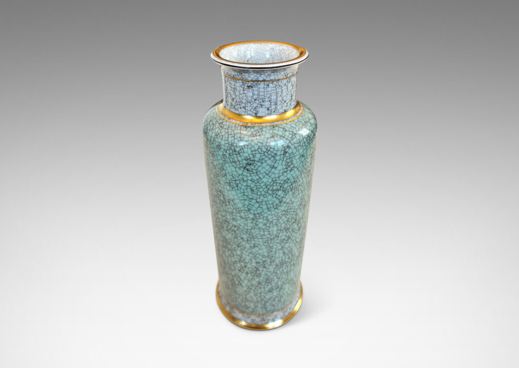 Gallery BAC tapered form with wide mouth and articulated lip, glazed in craquel celadon and pale gray, with gilded details
