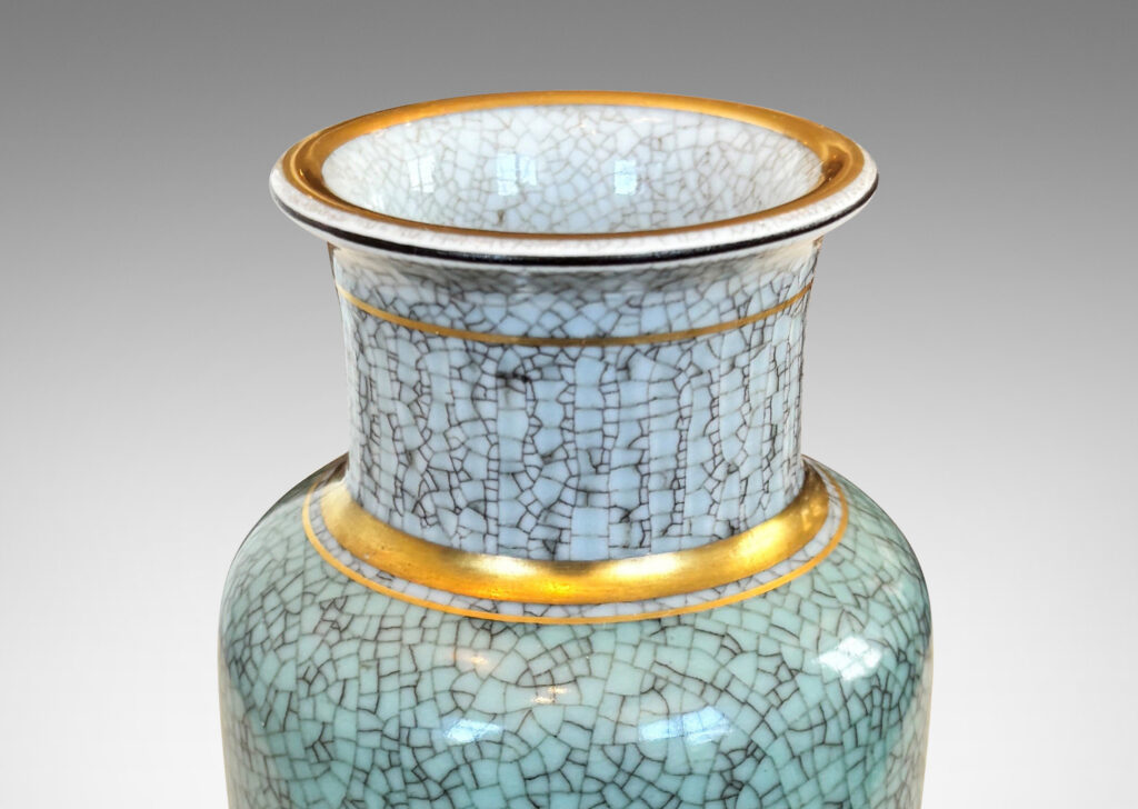Gallery BAC tapered form with wide mouth and articulated lip, glazed in craquel celadon and pale gray, with gilded details