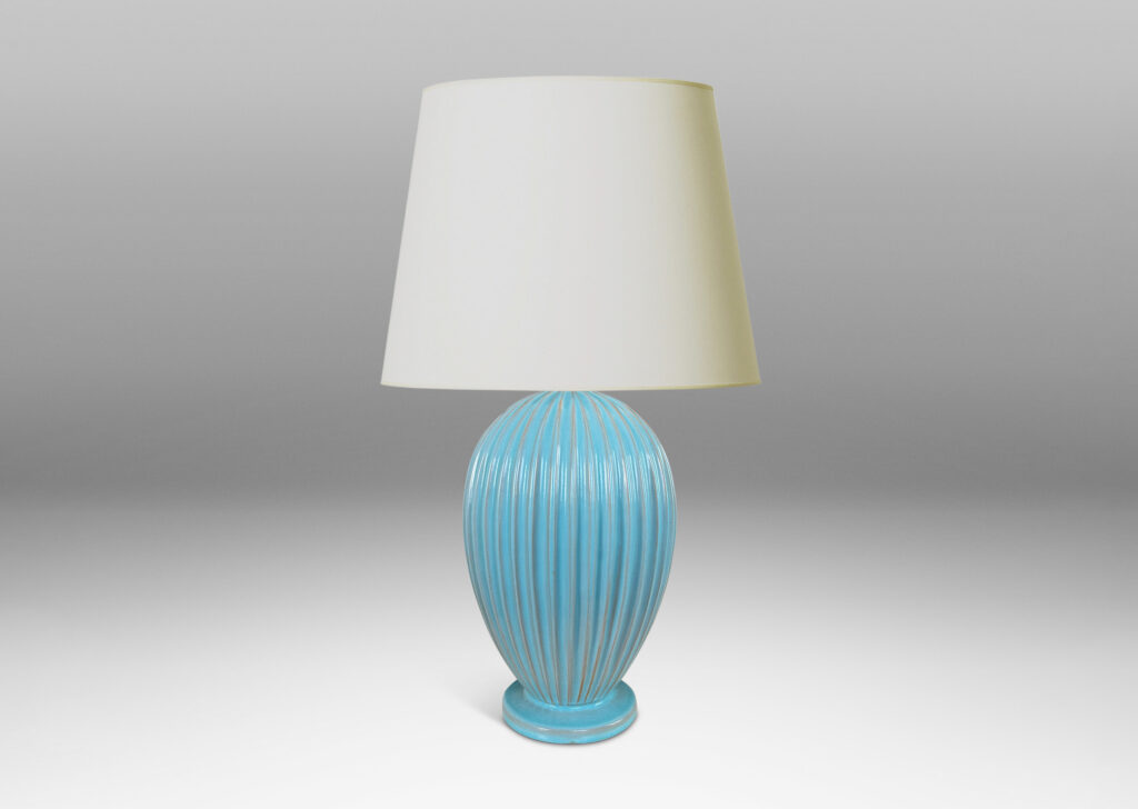 Gallery BAC fluted balloon form on a disk plinth, glazed in semi-shine light blue