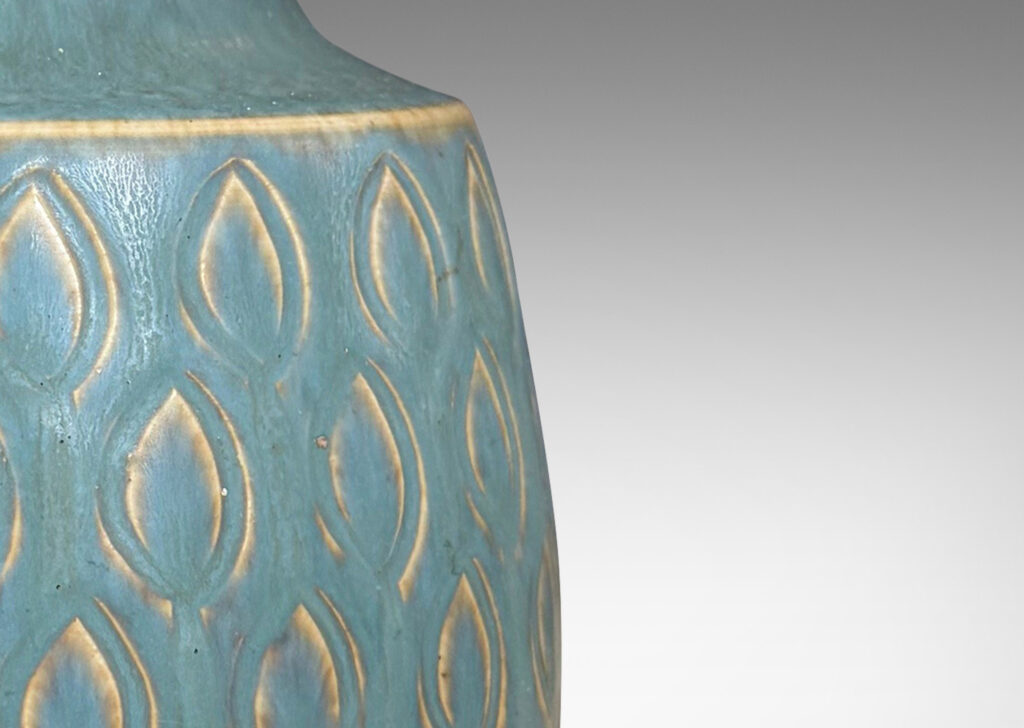 Gallery BAC pawn-like form, with swelling cylindrical form, sprouting neck, and impressed leaf motifs