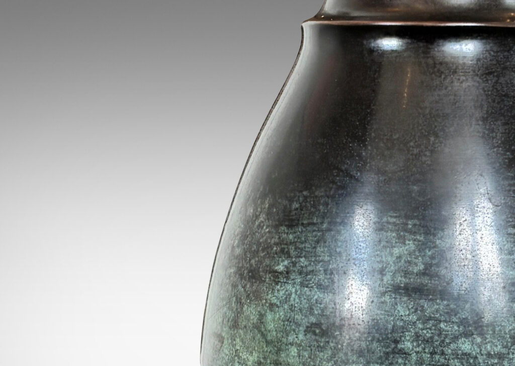 Gallery BAC arge drop form perched on a mitered octagonal base, with a wonderful original patination with verdigris highlight