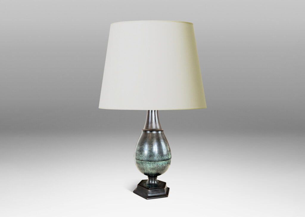 Gallery BAC arge drop form perched on a mitered octagonal base, with a wonderful original patination with verdigris highlight